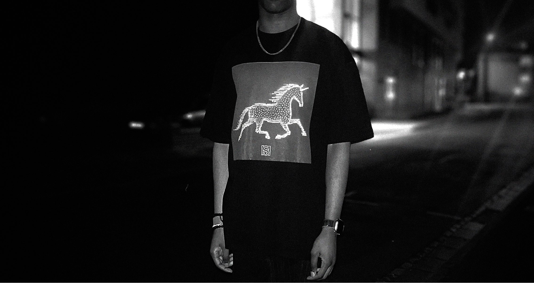 Founder wearing SM Celestial Charge T-shirt